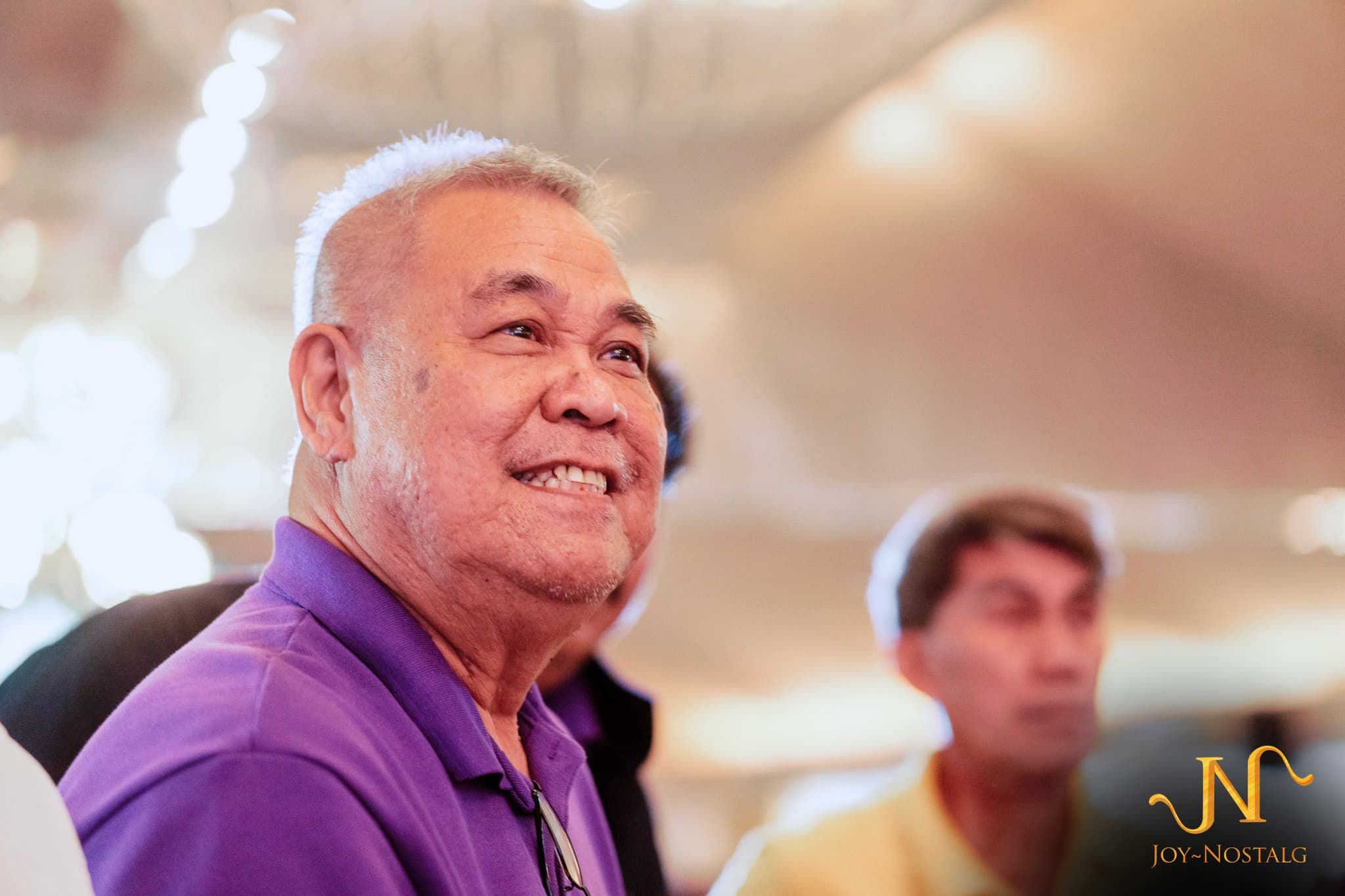 A Joy~Nostalg employee smiling during a company event