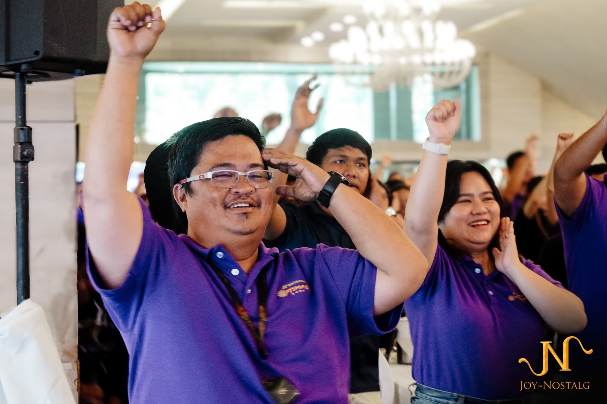Employees participating enthusiastically in a group activity